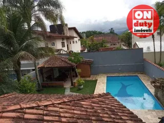 Imagem Lindo Sobrado com 3 suítes à venda, 220 m² por R$ 1.290.000 - Balneário Praia do Pernambuco - Guarujá/SP