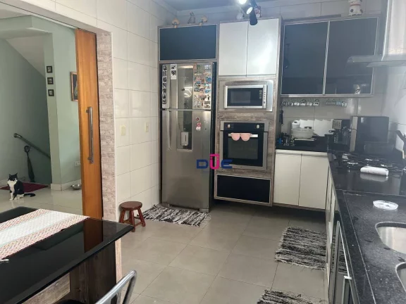 Imagem Sobreposta alta com 4 suítes, piscina e área gourmet à venda na Aparecida – Santos/SP