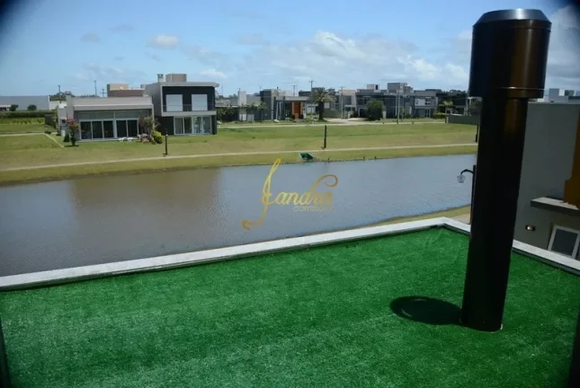 Imagem Sobrado condomínio fechado com 04 suites