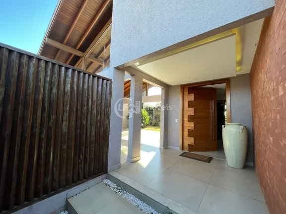 Imagem Linda casa com 3 suítes e sala de cinema