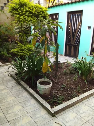 Imagem Casa à venda em Santo André-SP, Jardim Monções! 3 quartos, 1 suíte, 2 banheiros, 2 vagas de garagem, 163m². Confira!