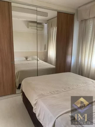 Imagem APARTAMENTO NO BOQUEIRÃO FRENTE MAR COM VARANDA E PORTEIRA F