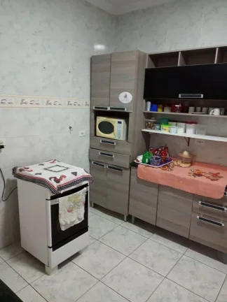 Imagem Casa com 2 dormitórios à venda, 72 m² por R$ 450.000 - Caiçara - Praia Grande/SP