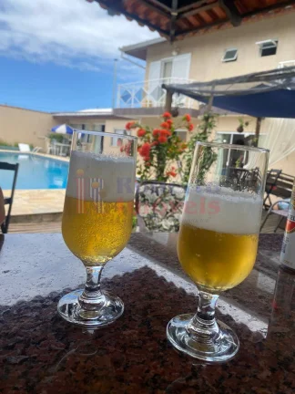 Imagem Casa de Locação Temporada com Piscina e Quiosque com Área Gourmet