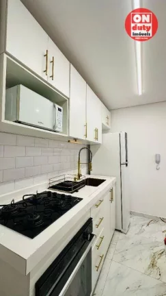 Imagem Apartamento com 2 dormitórios à venda, 46 m² por R$ 340.000,00 - Areia Branca - Santos/SP