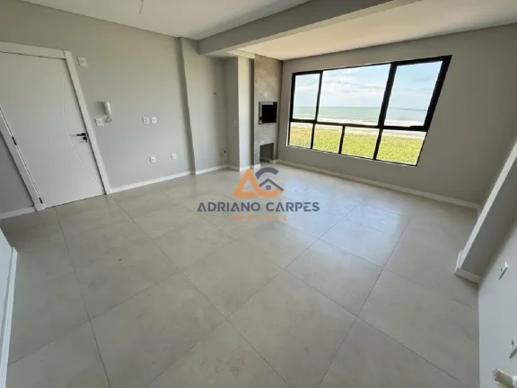 Imagem Apartamento novo, frente mar com 87m², 2 suítes e churrasqueira a carvão na Meia Praia - Navegantes Adriano Carpes Imóveis vende!