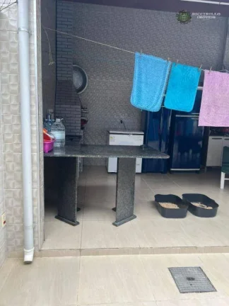 Imagem Casa com 5 dormitórios à venda, 200 m² por R$ 960.000,00 - Tupi - Praia Grande/SP