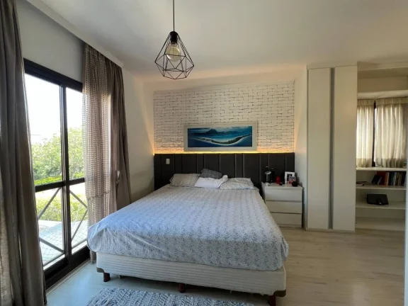 Imagem Casa com 5 quartos à venda, 180 m²