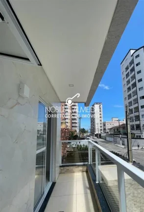 Imagem CASA COM SACADA NA QUADRA DA PRAIA