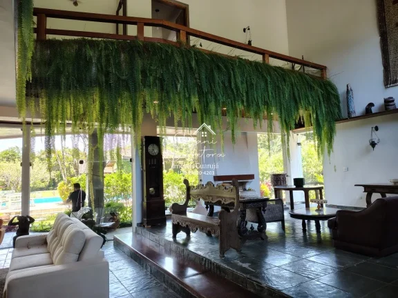 Imagem Espetacular Casa em Condomínio do Guarujá-SP - 4 Quartos, 4 Suítes, 5 Salas, 6 Vagas, 631,64m².