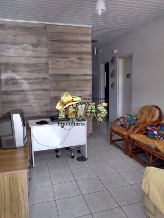 Imagem CASA À VENDA COM 3 SUÍTES ITANHAÉM