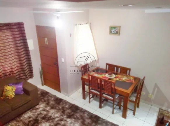Imagem Casa Geminada à Venda em Tude Bastos, Praia Grande - 2 Quartos e Churrasqueira