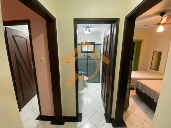 Imagem Imperdível! Apartamento à venda em Praia Grande-SP, Canto do Forte. 2 quartos, 1 suíte, 2 salas, 3 banheiros, 1 vaga. Condomínio Palm Beach, a 300m da praia.