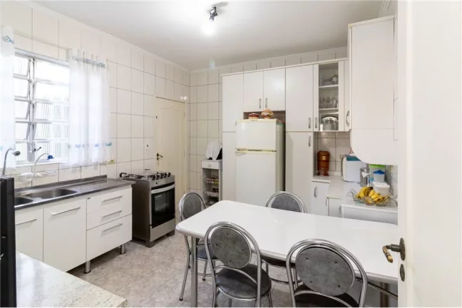 Imagem Sobrado com 5 casas e 1 galpão - Oportunidade de investimento ou moradia