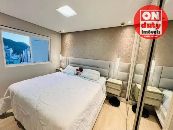 Imagem Apartamento com 2 dormitórios à venda, 96 m² por R$ 700.000 - Jardim Las Palmas - Guarujá/SP