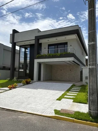 Imagem Casa de alto padrão com 4 dormitórios sendo 3 suítes e 4 vagas de garagem em Camboriú/SC