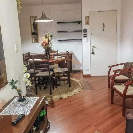 Imagem Apartamento com 2 dormitórios e 60 m² de área útil. Sala dois ambientes, cozinha com armários, ...