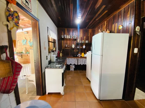 Imagem Imóvel imperdível: Casa à venda na Riviera de São Lourenço Módulo 20 com 3 quartos, 1 suíte, 3 salas, 4 vagas de garagem e mais!