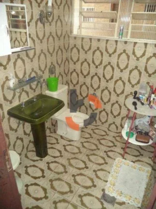 Imagem Oportunidade no Centro de NI: Casa Térrea com 2 Vagas a Pé do Calçadão