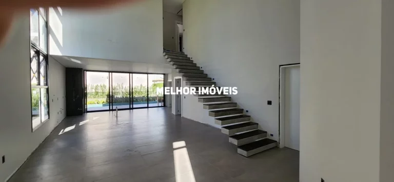 Imagem Casa Nova em condomínio fechado à venda com 5 suítes, 6 vagas de garagem localizada na Praia Brava .