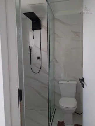 Imagem Triplex com 2 suítes à venda na Guilhermina em Praia Grande1