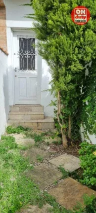 Imagem Casa com 3 dormitórios à venda, 105 m² por R$ 560.000,00 - Boqueirão - Santos/SP