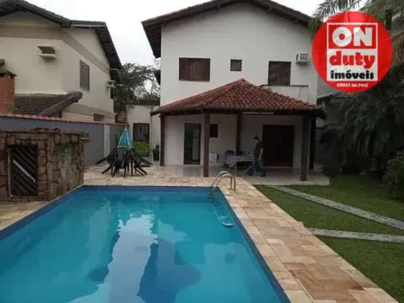 Imagem Lindo Sobrado com 3 suítes à venda, 220 m² por R$ 1.290.000 - Balneário Praia do Pernambuco - Guarujá/SP