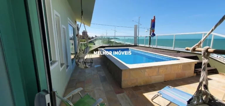 Imagem Casa Frente Mar á venda com 5 dormitórios sendo 1 suíte com vista mar em Balneário Piçarras