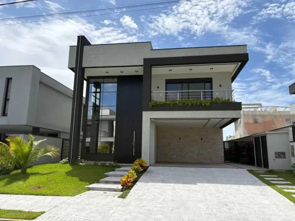 Imagem Casa de alto padrão com 4 dormitórios sendo 3 suítes e 4 vagas de garagem em Camboriú/SC