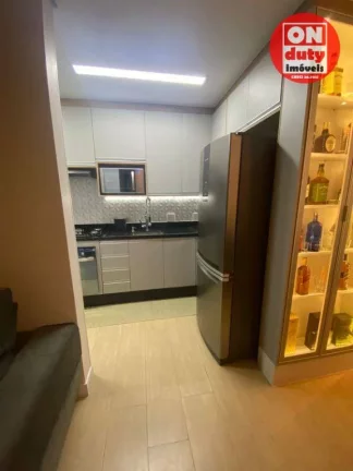 Imagem Apartamento com 2 dormitórios à venda, 45 m² por R$ 320.000,00 - Areia Branca - Santos/SP