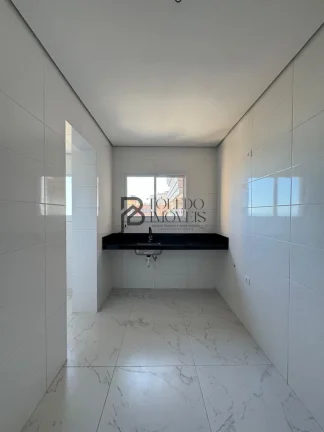 Imagem Apartamento de 2 Dormitórios sendo 1 suíte no bairro Caiçara - Praia Grande