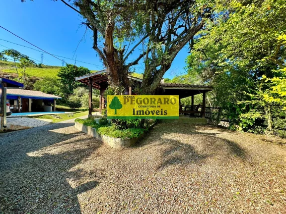 Imagem Magnífico Sítio de 3 Hectares com Cachoeira Privativa em Paraibuna-SP: 6 quartos, 1 suíte, 7 salas, 6 banheiros, 20 vagas de garagem.