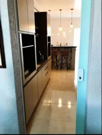 Imagem Casa à venda Farolândia, 3 quartos suíte, 135m², 2 salas, cozinha, 2 vagas, área de serviço