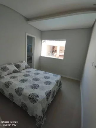 Imagem Casa de Alto Padrão na Aruana: 5 quartos, 4 suítes, posição Leste - Confira!
