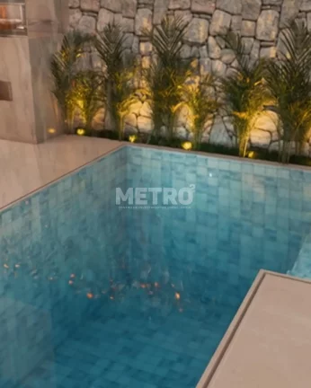 Imagem 3 suítes, duas delas com closets, Piscina, Área gourmet com churrasqueira.