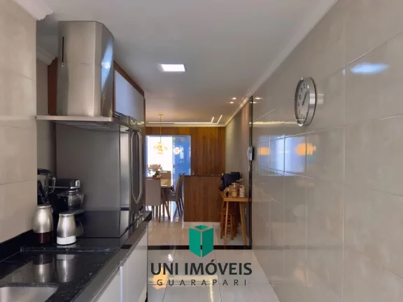 Imagem Triplex à venda em bairro nobre de Guarapari com área gourmet e deck para lagoa