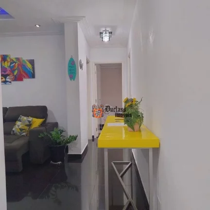 Imagem Apartamento com 2 dormitórios à venda, 63 m² por R$ 361.600 - Centro - São Vicente/SP