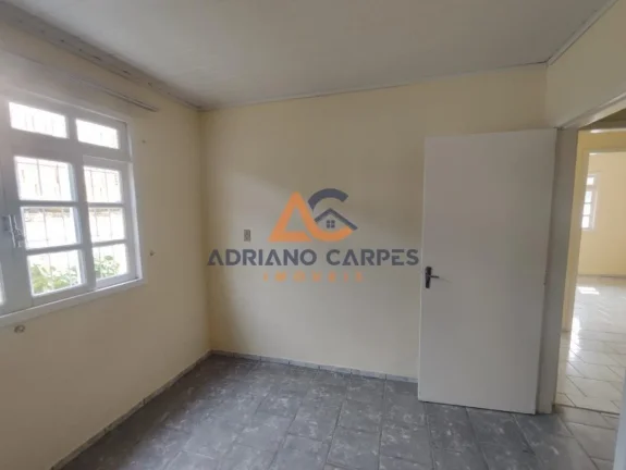Imagem Casa com 4 quartos há 700 metros da praia no bairro Meia Praia em Navegantes a venda na Adriano Carpes Imóveis vende
