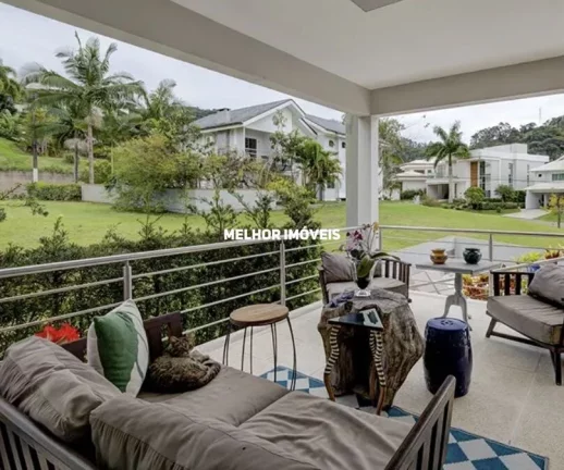 Imagem Casa em condomínio fechado á venda com 4 suítes, 2 vagas localizado na Praia Brava.