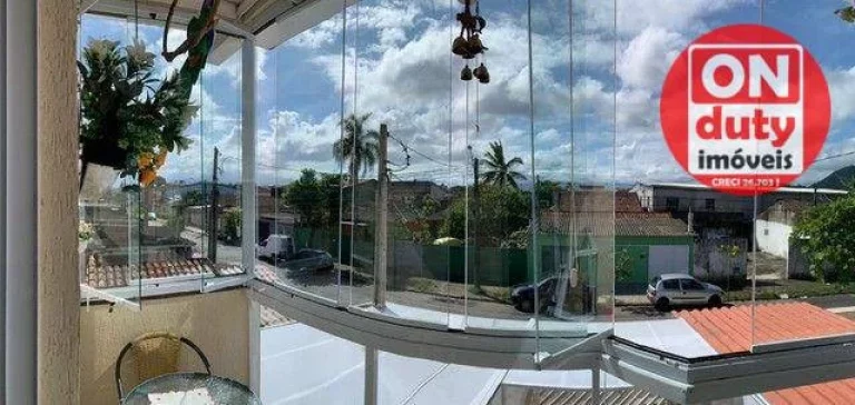 Imagem Sobrado com 2 dormitórios à venda, 135 m² por R$ 540.000,00 - Vila Santa Rosa - Guarujá/SP