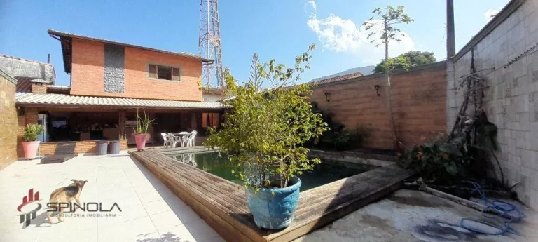 Imagem Sobrado com 3 dormitórios à venda, 180 m² por R$ 1.100.000,00 - Solemar - Praia Grande/SP