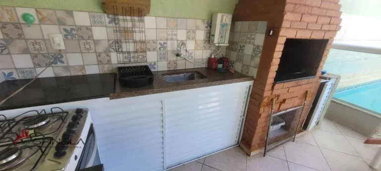Imagem Casa com 2 dormitórios à venda, 77 m² por R$ 680.000,00 - Real - Praia Grande/SP