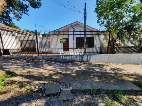 Excelente casa de três dormitórios em ótima localização