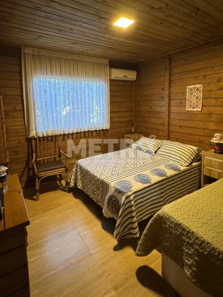 Imagem Casa à venda, no Brisas do Rio com Três quartos, piscina, jardim, muito verde