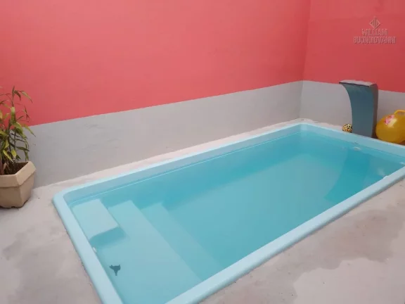 Imagem Casa térrea 2 dormitórios sendo 1 suíte com piscina Ocian
