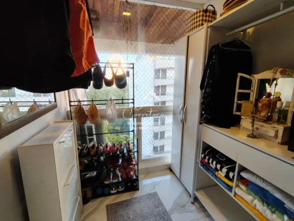 Imagem Imperdível! Apartamento de 2 quartos com suíte e 2 vagas de garagem em Pitangueiras, Guarujá-SP - 78m² de conforto e elegância!