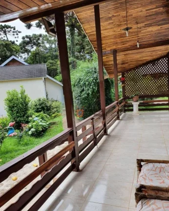 Imagem Casa com 3 dormitórios à venda, 235 m² por R$ 1.250.000,00 - Alto Do Capivari - Campos do Jordão/SP