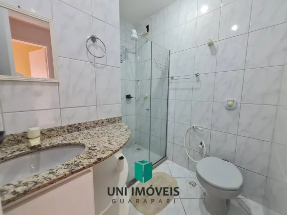 Imagem Apartamento à venda na Praia do Morro em Guarapari - Varanda, Elevador e Vista lateral para o mar