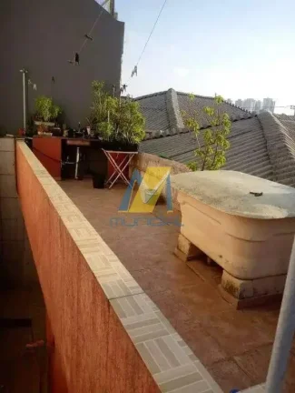 Imagem Sobrado amplo com edícula e 5 vagas de garagem independente