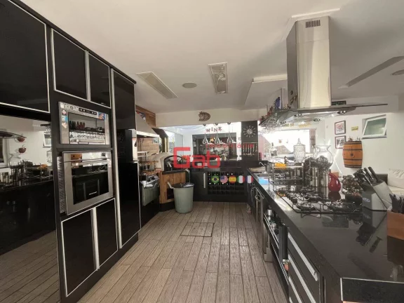 Imagem Casa 5 Suítes em Condomínio Fechado